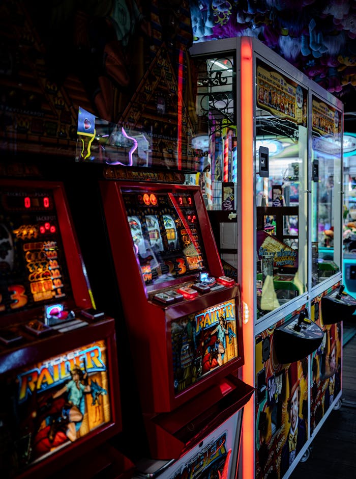Vibrant arcade setting in Hamburg showcasing slot machines and claw games in a lively atmosphere.